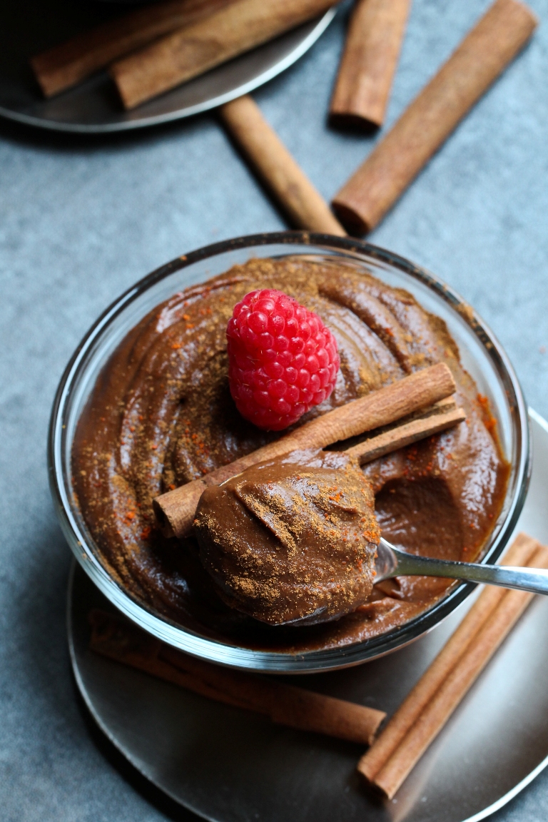 Spoon dipping into Mexican Chocolate Sweet potato pudding