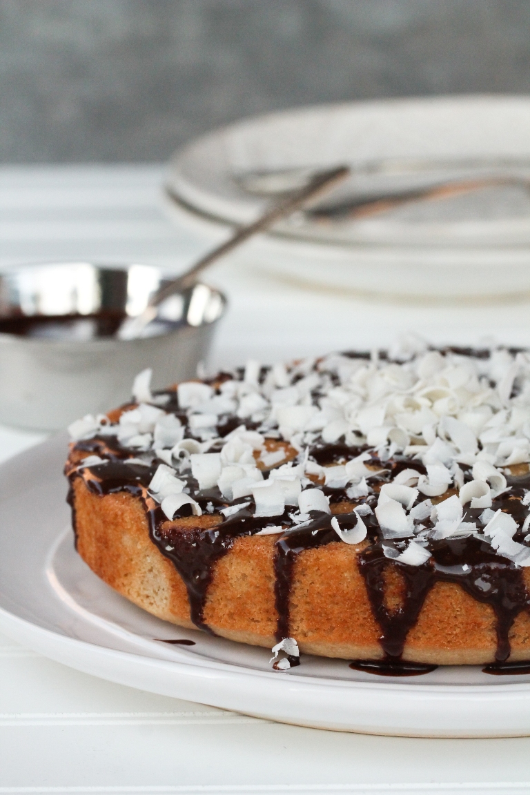 Vegan vanilla cake with chocolate ganache and white chocolate curls